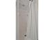 Clean shower features a shower curtain and a built in shelf for toiletries at 123 Saint Kitts Way, Apollo Beach, FL 33572