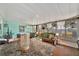 Inviting sunroom with a vaulted ceiling and an abundance of natural light at 123 Saint Kitts Way, Apollo Beach, FL 33572