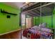 This is a bedroom with a bunk bed frame and wood laminate flooring at 12628 White Bluff Rd, Hudson, FL 34669