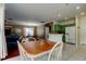 Bright dining area adjacent to the kitchen and living space at 12628 White Bluff Rd, Hudson, FL 34669