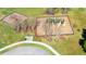 Overhead view of neighborhood playground with swings, slide, and benches; a fun and safe outdoor play area at 12628 White Bluff Rd, Hudson, FL 34669