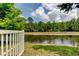 Scenic view of a tranquil pond accessible from the property at 12628 White Bluff Rd, Hudson, FL 34669