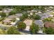 Aerial view of property showcasing the house, backyard, and surrounding neighborhood at 12806 Castlemaine Dr, Tampa, FL 33626