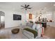 Open-concept living room with a modern kitchen, island and a cozy seating area at 12806 Castlemaine Dr, Tampa, FL 33626