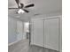 Spacious bedroom featuring new floors and an attached bathroom with updated fixtures at 13110 Mitchell St, Tampa, FL 33612