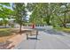 Home exterior features a red front door, well-maintained landscaping, and a brick walkway adding to its appeal at 13110 Mitchell St, Tampa, FL 33612