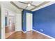 Neutral bedroom with hardwood floors, a closet, and a door leading to another room at 1333 Dragon Head Dr, Valrico, FL 33594