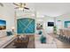 Bright living room with modern decor, sleek furniture, and a unique accent wall design at 1333 Dragon Head Dr, Valrico, FL 33594