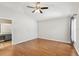 Bright and airy main bedroom with hardwood floors and ensuite bathroom at 1333 Dragon Head Dr, Valrico, FL 33594