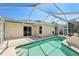 The home features a beautiful in-ground pool and patio area, creating an ideal space for outdoor enjoyment at 1333 Dragon Head Dr, Valrico, FL 33594