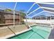 Enjoy Florida living with this sparkling pool, enclosed in a screen cage, offering privacy and sunshine at 1333 Dragon Head Dr, Valrico, FL 33594