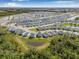 Panoramic aerial view of the community, showcasing the well-maintained homes and scenic ponds at 13981 Lilac Sky Ter, Bradenton, FL 34211
