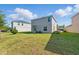 Spacious backyard with lush green grass, offering plenty of room for outdoor activities and relaxation at 13981 Lilac Sky Ter, Bradenton, FL 34211