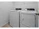 Laundry room with new washer and dryer at 13981 Lilac Sky Ter, Bradenton, FL 34211