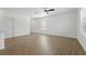 Spacious living room with modern ceiling fan and ample natural light at 13981 Lilac Sky Ter, Bradenton, FL 34211