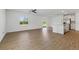 Open-concept living space with bright natural light and sliding door access at 13981 Lilac Sky Ter, Bradenton, FL 34211