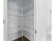 Pantry with metal shelving at 13981 Lilac Sky Ter, Bradenton, FL 34211