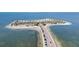 Expansive aerial view of Sunset Beach surrounded by clear blue water at 1424 Ridge Shore Dr, Tarpon Springs, FL 34689