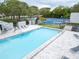 Community pool and basketball courts perfect for neighborhood fun and summer relaxation at 1424 Ridge Shore Dr, Tarpon Springs, FL 34689