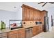 Gourmet kitchen with stainless steel appliances, granite countertops, and custom cabinetry at 1424 Ridge Shore Dr, Tarpon Springs, FL 34689