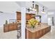 Gourmet kitchen with stainless steel appliances, a large island, and granite countertops at 1424 Ridge Shore Dr, Tarpon Springs, FL 34689