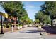 Charming downtown streetscape with sidewalks, trees and colorful buildings at 1424 Ridge Shore Dr, Tarpon Springs, FL 34689