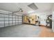 Clean garage includes work area, storage, and garage door, offers versatile space at 15014 Winterwind Dr, Tampa, FL 33624