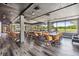This spacious dining area has large windows with views of the golf course at 16214 W Course Dr, Tampa, FL 33624