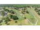 Beautiful view of the golf course featuring lush fairways, manicured greens, and mature trees at 16214 W Course Dr, Tampa, FL 33624