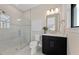Modern bathroom with a glass-enclosed shower, minimalist vanity, and contemporary fixtures, creating a spa-like atmosphere at 16411 Sapphire Point Dr, Lakewood Ranch, FL 34211