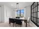 Elegant dining room with large window offering picturesque outdoor views at 16415 Sapphire Point Dr, Lakewood Ranch, FL 34211