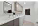Well-organized laundry room with modern appliances, ample counter space, and stylish storage cabinets at 16415 Sapphire Point Dr, Lakewood Ranch, FL 34211