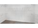 An empty walk-in closet with ample storage space and wire shelving at 16415 Sapphire Point Dr, Lakewood Ranch, FL 34211