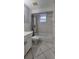 Clean bathroom featuring a tub, shower, toilet, and a vanity at 1708 E Genesee St, Tampa, FL 33610