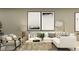 Cozy living room featuring a comfortable sectional sofa and stylish decor at 17506 Nectar Flume Dr, Land O Lakes, FL 34638