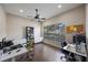 Study with wood floors, neutral colored walls, a ceiling fan and lots of natural light at 18520 Ambly Ln, Tampa, FL 33647