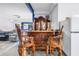 Entertain in style with a wooden bar and comfortable seating in the spacious entertainment room at 2101 N Pointe Alexis Dr, Tarpon Springs, FL 34689