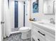 Modern bathroom features a shower, vanity and decorative tile work, adding a touch of elegance at 2101 N Pointe Alexis Dr, Tarpon Springs, FL 34689