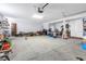 Spacious garage with ample room for storage and projects at 2101 N Pointe Alexis Dr, Tarpon Springs, FL 34689