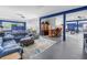 Spacious living room perfect for entertaining with a pool table and a full bar setup at 2101 N Pointe Alexis Dr, Tarpon Springs, FL 34689