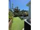 Outdoor dining area beneath a leafy pergola at 212 41St S St, St Petersburg, FL 33711