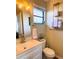 Bright bathroom with a white vanity, and updated fixtures at 212 41St S St, St Petersburg, FL 33711