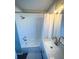 Neat bathroom featuring a tub shower, sink and vanity with good lighting at 212 41St S St, St Petersburg, FL 33711