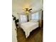 Comfortable bedroom with hardwood floors, and plenty of natural light at 212 41St S St, St Petersburg, FL 33711