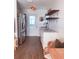 Modern kitchen featuring stainless steel appliances, ample storage, and open shelves at 212 41St S St, St Petersburg, FL 33711