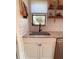 Bright kitchen features a stainless steel sink, granite countertops, and white cabinets at 212 41St S St, St Petersburg, FL 33711