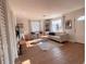 Inviting living room with wood flooring, modern decor, and ample natural light at 212 41St S St, St Petersburg, FL 33711