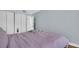 Cozy bedroom with a closet and doorway at 2211 Belleair Rd # D3, Clearwater, FL 33764