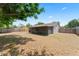 Backyard with a large screened porch and privacy fence at 2214 Selkirk St, Valrico, FL 33594