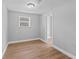 Cozy bedroom with ample natural light and neutral tones, ready for personalization at 2214 Selkirk St, Valrico, FL 33594